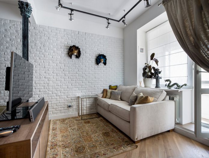 woonkamer met wit bakstenen behang