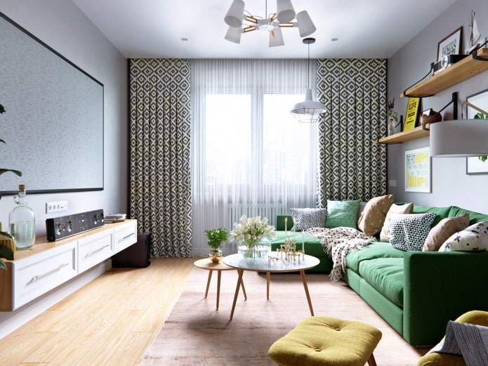 φωτεινό δωμάτιο με πράσινο καναπέ