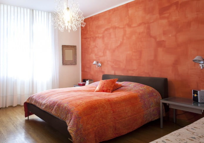 oranje pleister op de muur