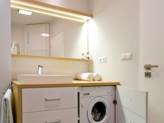 mosógép a fürdőszobában modern stílusban