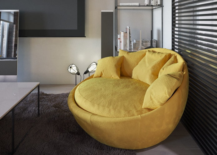 ovali geltona sofa interjere