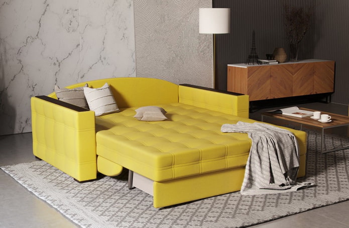 sulankstoma sofa geltonos spalvos interjere