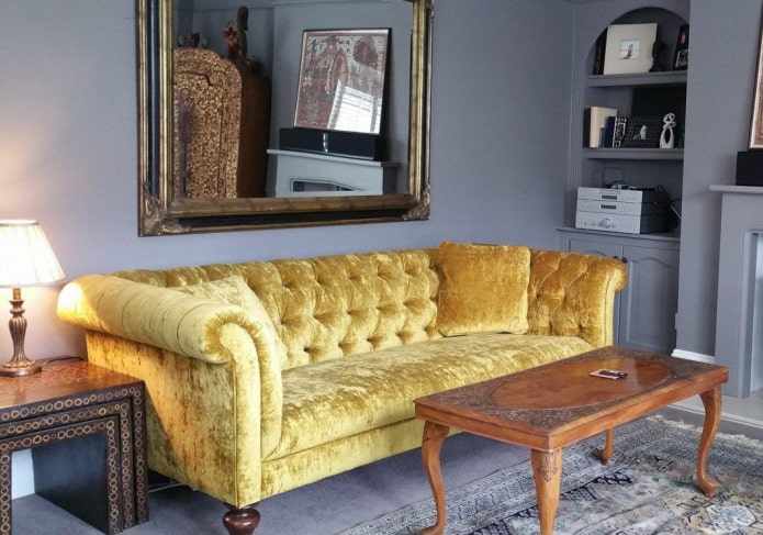 geltona chesterfield sofa interjere